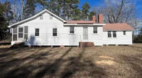 Character and Potential Await: North Carolina Farmhouse for Sale with 10.07 Acres of Scenic land