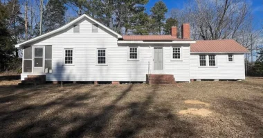 Character and Potential Await: North Carolina Farmhouse for Sale with 10.07 Acres of Scenic land