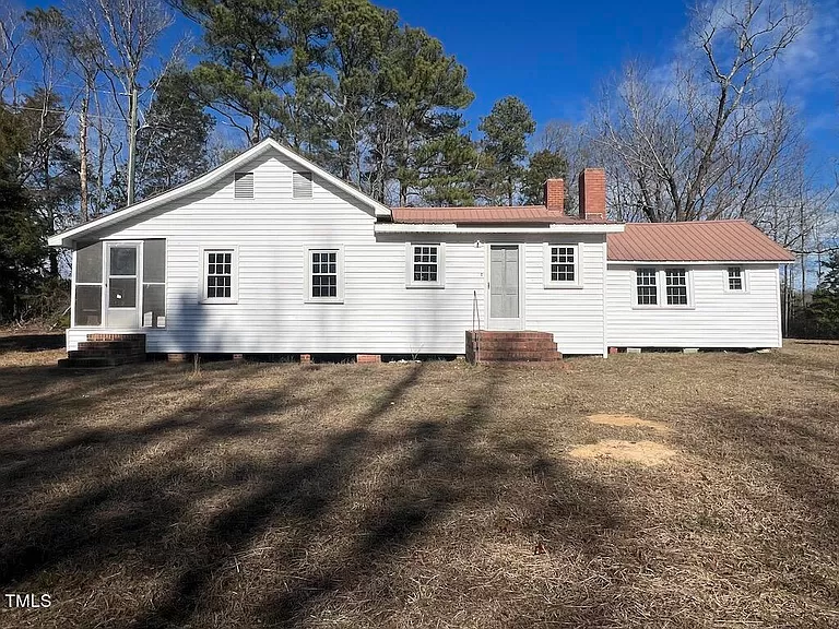 Character and Potential Await: North Carolina Farmhouse for Sale with 10.07 Acres of Scenic land