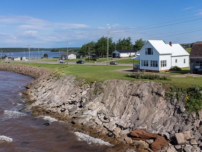 Tranquil Seaside Living: Updated Two-Bedroom Prince Edward Island Waterfront Home for Sale