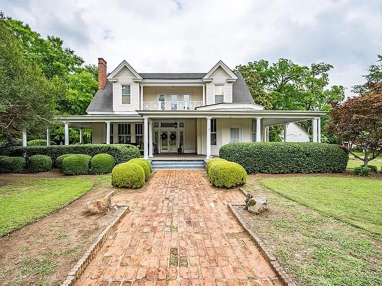 Charming Georgia Cheap Homes for Sale, Luxurious Southern Living in a Victorian Home with Wrap-Around Porch.