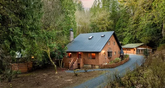 Your private Washington cabins for sale: 5-Bedroom Log Cabin with Year-Round Creek and Gourmet Kitchen.