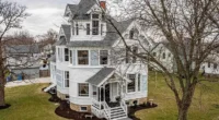 Charming Wisconsin homes for sale: discover this renovated Victorian home with modern amenities.