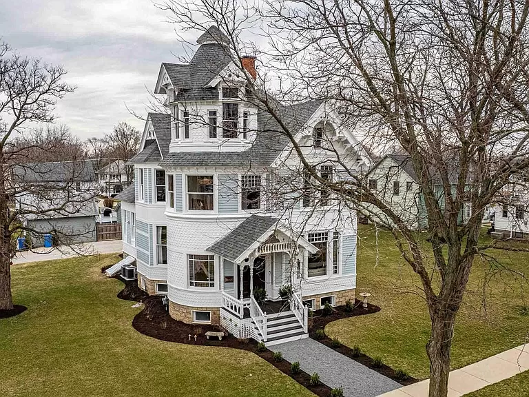 Charming Wisconsin homes for sale: discover this renovated Victorian home with modern amenities.