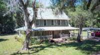 Your dream Florida home for sale, Explore this 1929 home on 5.29 acres of land.