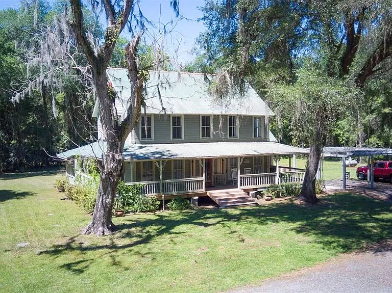 Your dream Florida home for sale, Explore this 1929 home on 5.29 acres of land.