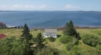 East Coast Maine waterfront home for sale: Discover the oceanfront vacation cottage in Lubec, Maine.