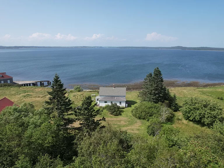 East Coast Maine waterfront home for sale: Discover the oceanfront vacation cottage in Lubec, Maine.