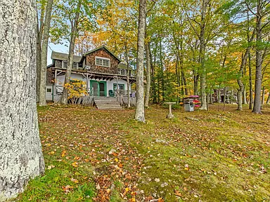 Charming New Hampshire lakefront cabins for sale: year-round Squam Lake cabins with private waterfront.