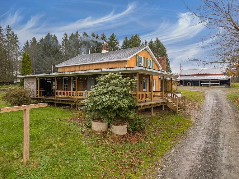 Explore a New York farmhouse for sale on 236 acres of cheap farm land.