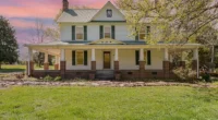 Charming North Carolina farmhouse for sale. Countryside 3-Bedroom Farms is on 46 acres of property.