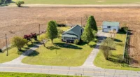 Idyllic North Carolina Farmhouse for Sale, Picturesque Countryside Retreat with Covered Porches.