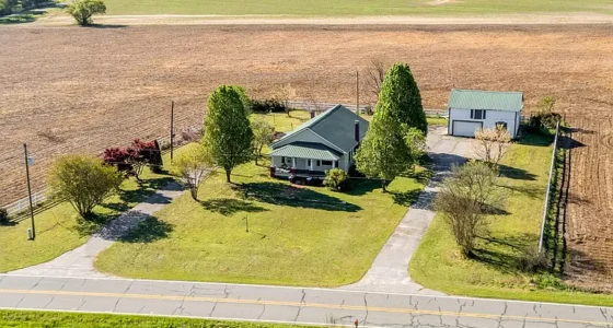 Idyllic North Carolina Farmhouse for Sale, Picturesque Countryside Retreat with Covered Porches.