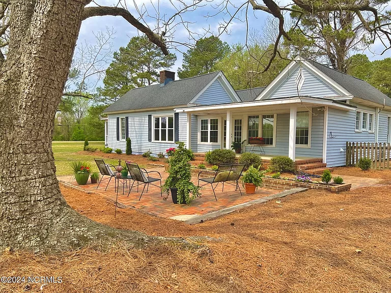 Charming North Carolina Home for Sale: Find Serenity in Your Renovated Home with Front and Side Porches