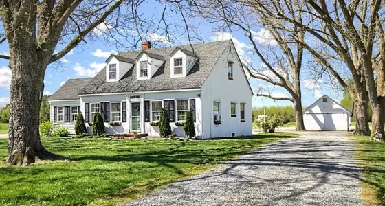 Charming Virginia homes for sale: embrace comfort and tranquility in this Cape Cod Home.