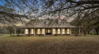 Adorable Mississippi farmhouse for sale, a 3-bedroom homestead on 34 acres of land.