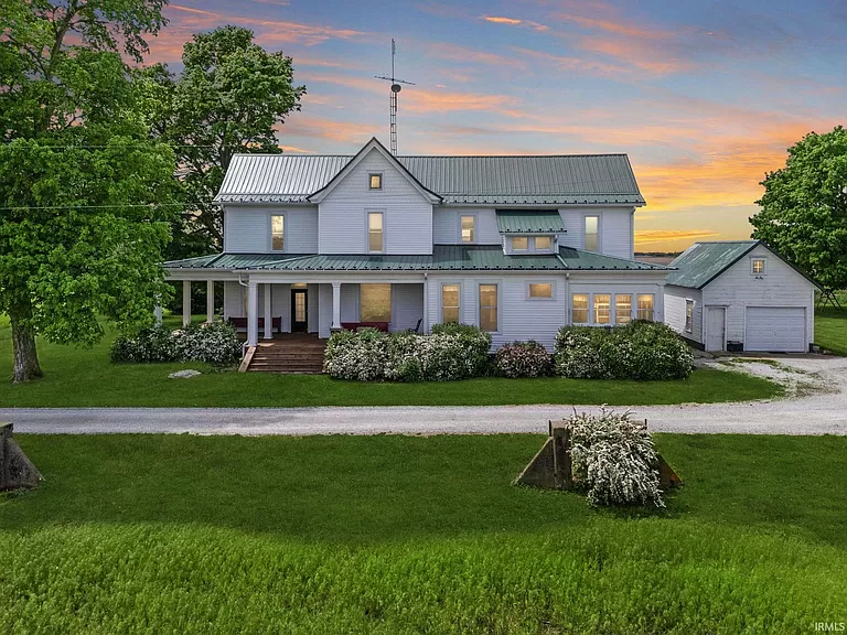 Adorable Indiana farmhouse for sale, Your private homestead is on 5.5 acres in Fulton County.