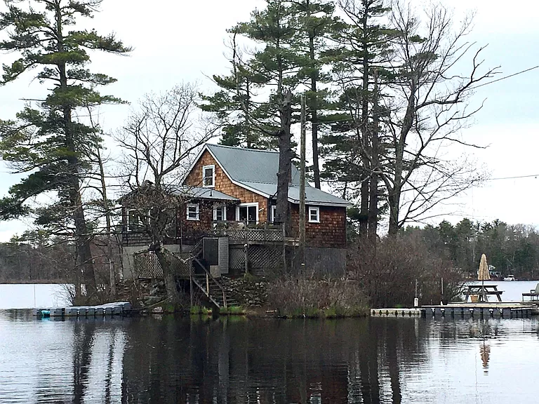 Charming New Hampshire waterfront homes for sale; own your private island in Aruba North.