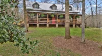 Adorable Tennessee cabins for sale: Secluded Log Cabin Homestead with Year-Round Creek.