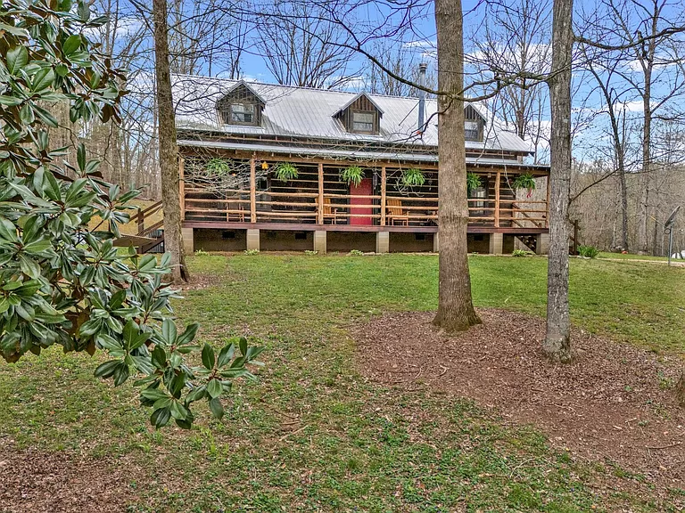 Adorable Tennessee cabins for sale: Secluded Log Cabin Homestead with Year-Round Creek.