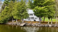 Charming Vermont lakefront cabin for sale: Your spacious summer cottage on Lake Carmi.