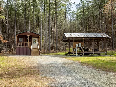 Charming Virginia cabins for sale, move-in-ready homes on 10 acres with a lake.