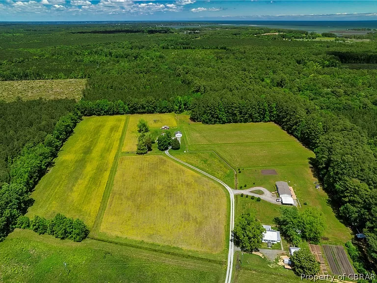 Affordable Virginia farmhouse for sale, 27+ acres of homestead paradise in Diggs..