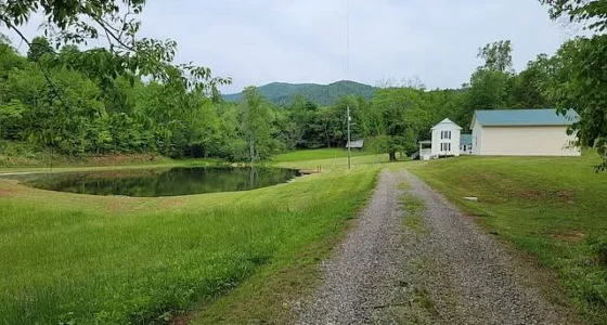 Charming Virginia farms for sale: Breathtaking Farmhouse on 42 Acres with Pond.