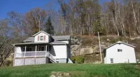 Historic West Virginia farmhouse for sale, Explore this 30-acre farmland with the river frontage.