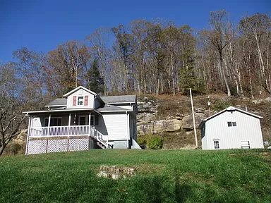 Historic West Virginia farmhouse for sale, Explore this 30-acre farmland with the river frontage.