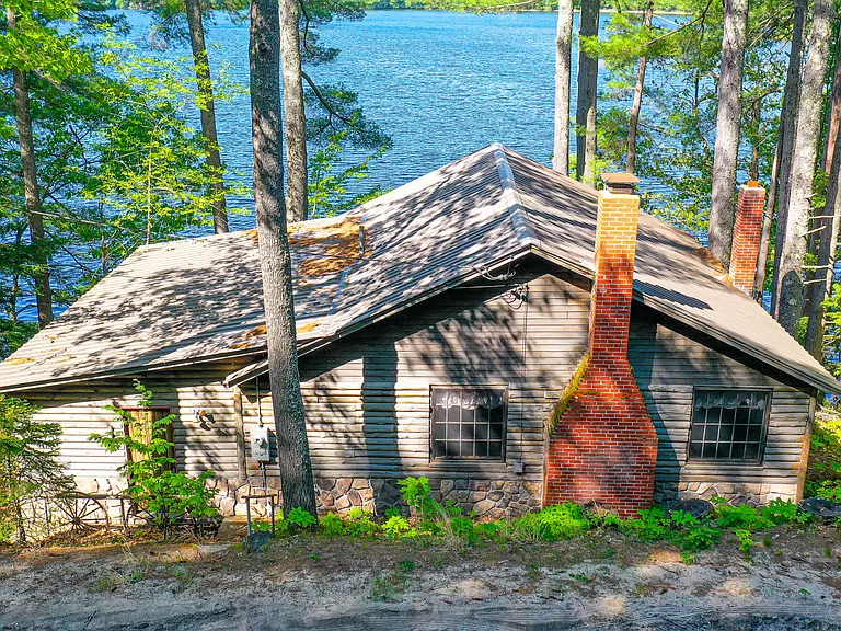 Adorable Maine Waterfront Cabins for Sale: Quaint 1950s Log Cabin in Maine.