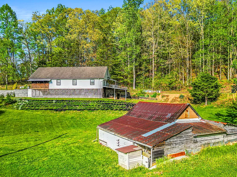 Affordable Tennessee Farmhouse for Sale: TN Real Estate on 2 Acres.