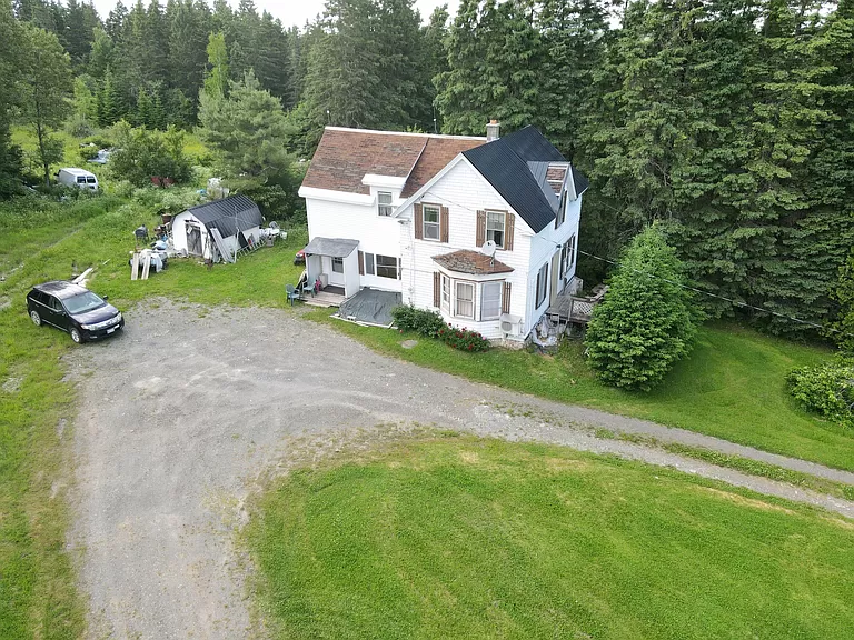 Maine Home with Land for Sale, a 6-acre cheap farmhouse in New Sweden.