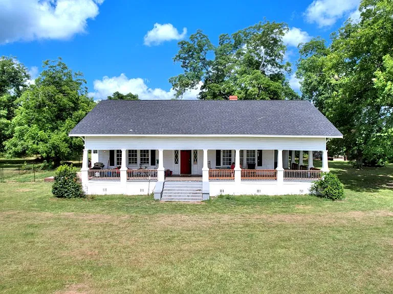 Discover this Georgia Farmhouse for Sale on picturesque 5-acre land.