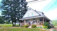 Charming Maine Waterfront Property for Sale on 3.6 acres with a Farmhouse.