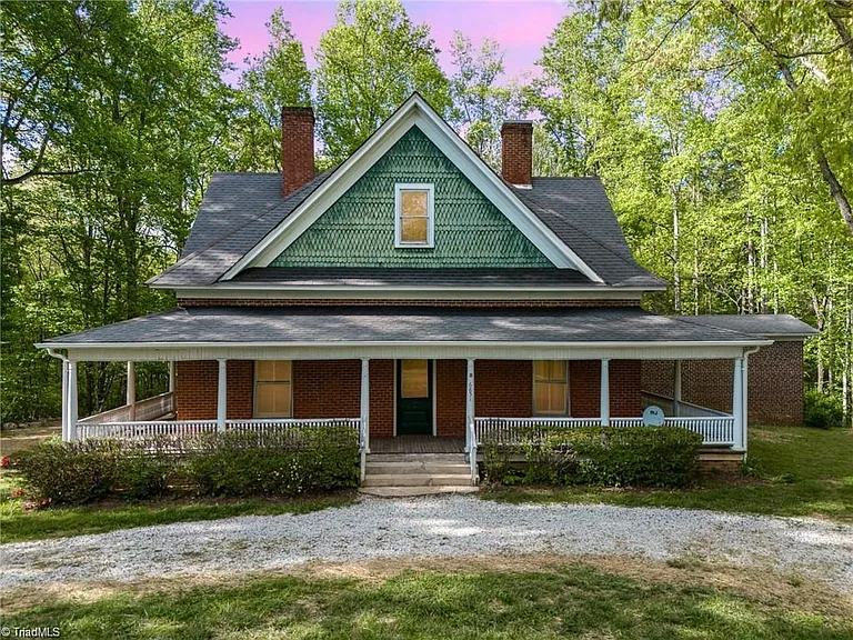 North Carolina Farmhouse for Sale: 3.34 Acres of Unrestricted Land and Unique Details.