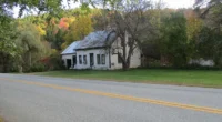 Fixer Upper Vermont Farmhouse for Sale on 28 Acres of Scenic Vermont Land.