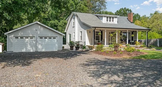 Charming North Carolina Farmhouse for Sale: Rustic Charm Meets Modern Comforts.