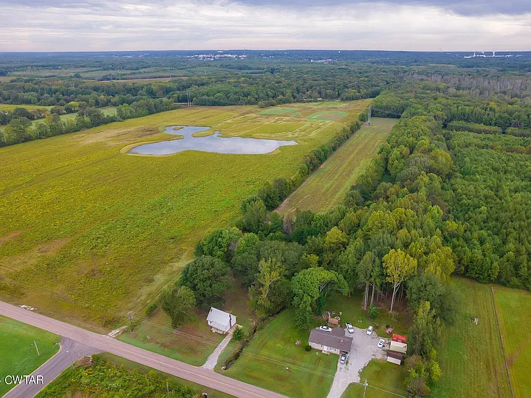 Tennessee Farmhouse for Sale: A Remodeled Home with 31 Acres and Soybean Lease.